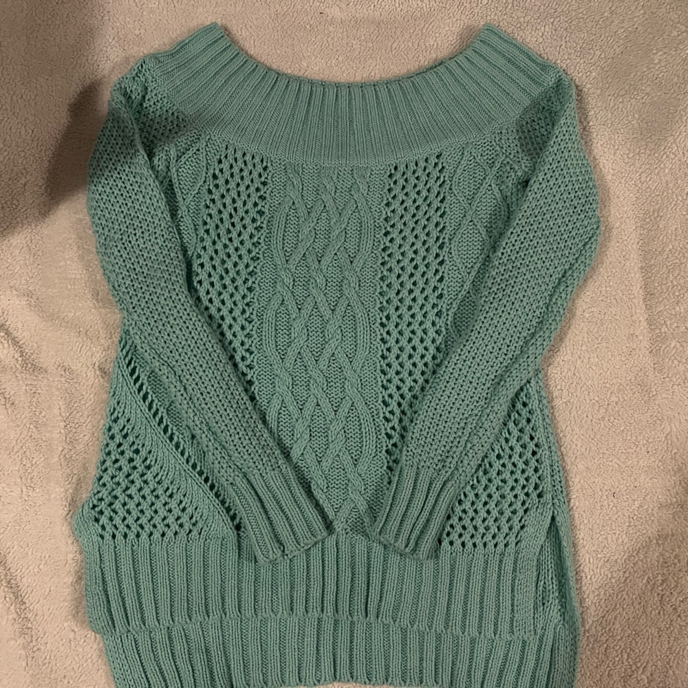 Green knitted sweater